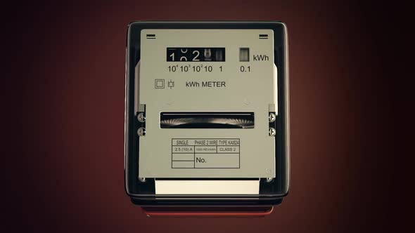 Analog electricity meter showing household consumption in kilowatt hours. alt