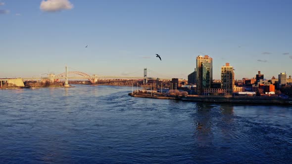 Drone Flying Over Manhattan Against Sky alt