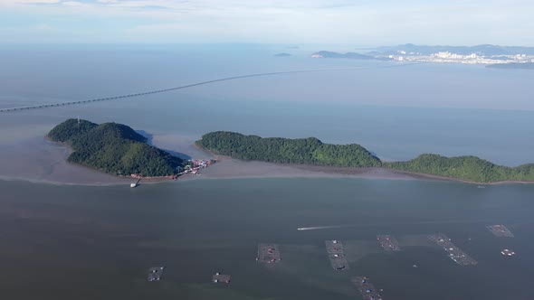 Aerial view fishing boat move at kelong near island alt