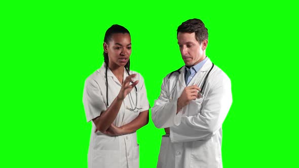 a Caucasian people with a surgeon blouse and scrumbs in a green