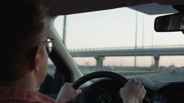 The Road to Success  a Driver Traveling on a Road to the Sun alt