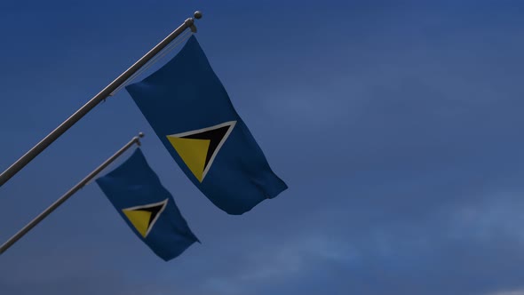 Saint Lucia Flags In The Blue Sky - 4K