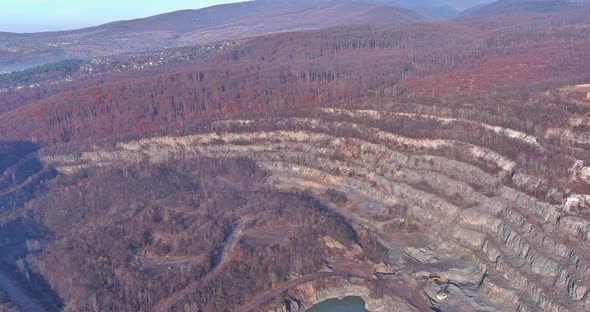 Large Quarry for Mining with a Finished Product Crushed Stone in the Foreground Top View Panorama alt