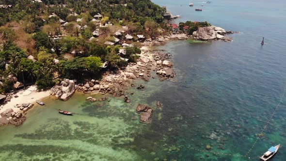 Small Houses on Tropical Island. Tiny Cozy Bungalows Located on Shore of Koh Tao Island alt