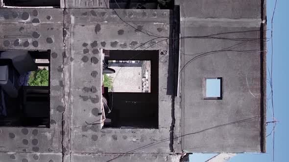 Vertical Video of War in Ukraine  Destroyed House alt