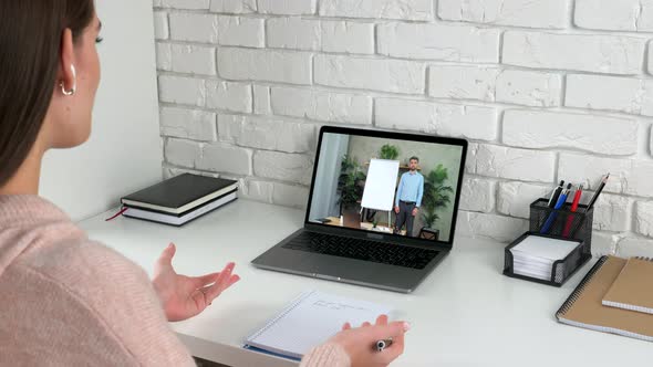 Woman in Home Study Online Video Conference Call Webcam Laptop Tells Teacher alt