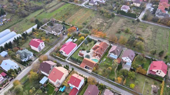Beautiful of Aerial View From the Height of the Rural Village with Houses and Streets Plowed Fields alt