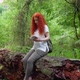 Girl Reading a Book in The Forest - VideoHive Item for Sale