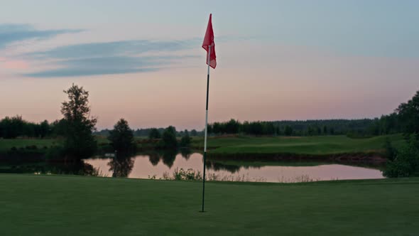 Golf Course Red Flag in Golfing Hole alt