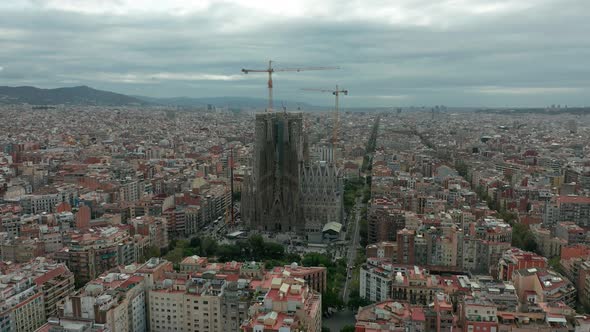 Sagrada Familia Cathedral And Barcelona City Aerial View In Spain By Aerocaminua