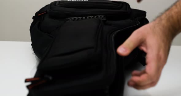Closeup of Male Musicians and Playing the Strings of an Acoustic Guitar alt