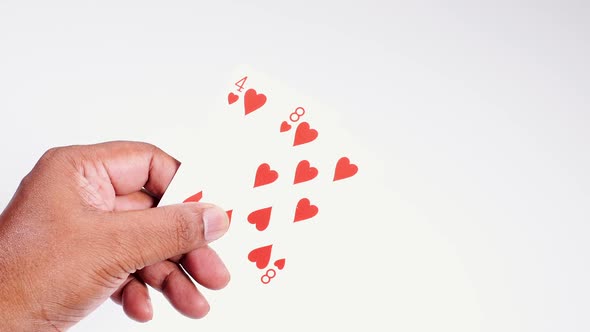 Indian Hand Holds A Four And Eight alt