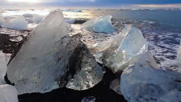 Icebergs on a Black Volcanic Beach Chunk of Ice on Diamond Beach Iceland alt