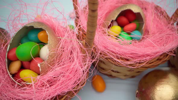 Easter Egg with Colorful Candies in a Basket Close Up