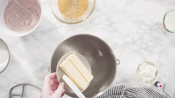 Flat lay. Step by step. Mixing ingredients in a standing kitchen mixer to prepare cream cheese frost alt