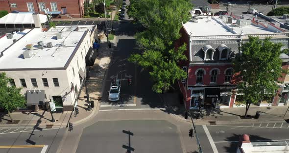 Franklin, Tennessee downtown buildings with drone video moving sideways. alt