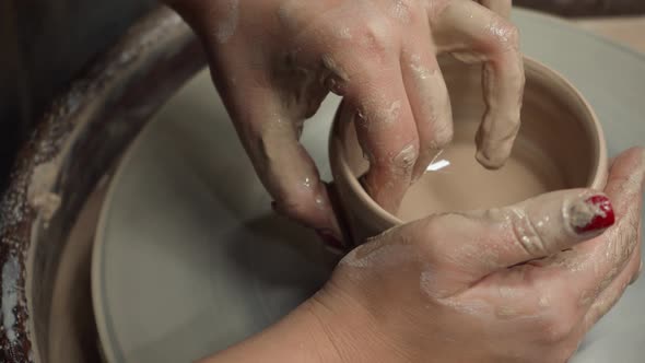 Sculpting on a Potter's Wheel Bowls Pots or Mugs