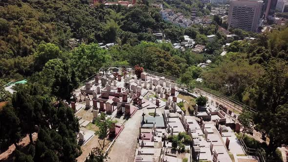 Aerial View Of Hong Kong Tao Fong Shan Christian Cemetery On A Hilltop Looking Over Sha Tin Surround alt