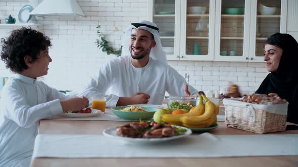 arabian family spending time together at home alt