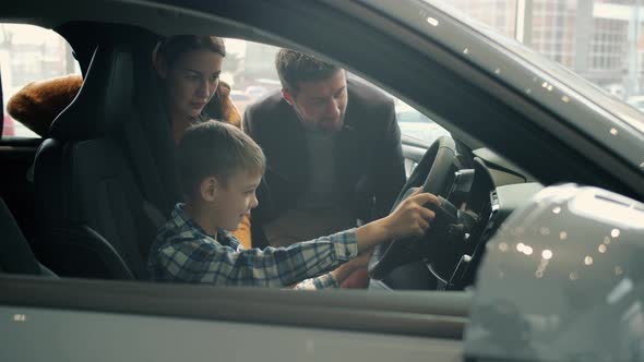 little kids driving cars