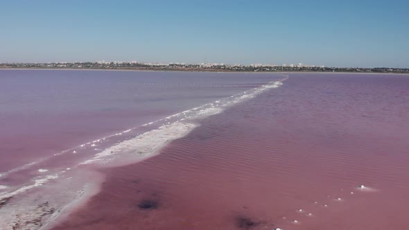 Old salt piles on coastline of Kuyalnik estuary. Concept of global warming on planet alt