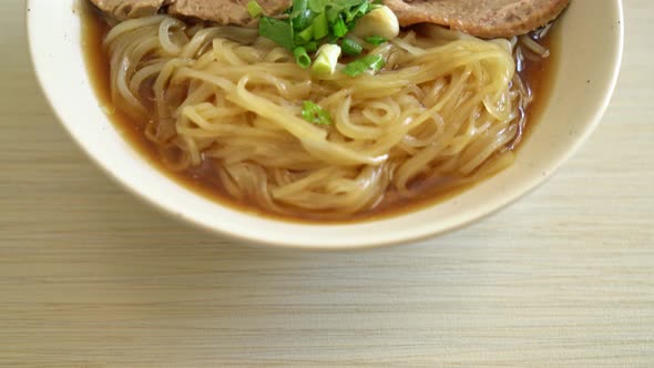 duck noodles with stewed duck soup - Asian food style alt