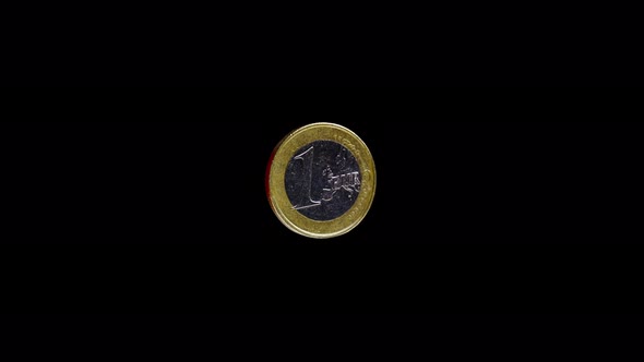 Shiny One Euro Coin with Ribbed Side on Black Background alt