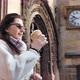 Medium Shot Female Tourist Drinking Paper Coffee Cup Admiring Amazing Medieval Architecture