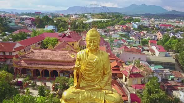 Aerial View Wonderful Large Golden Buddha in Meditation Pose alt