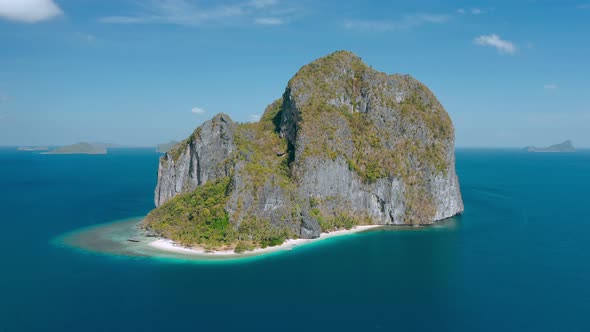 Aerial Drone View of Karst Rocky Pinagbuyutan Island in Blue Sea of El Nido Palawan Philippines alt