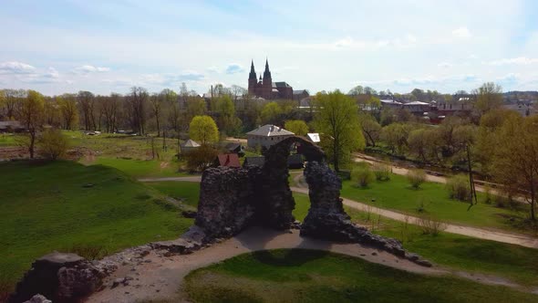 Old Stone Ruins of an Ancient Castle in Rezekne, Latvia. Aerial 4K Dron Shot alt
