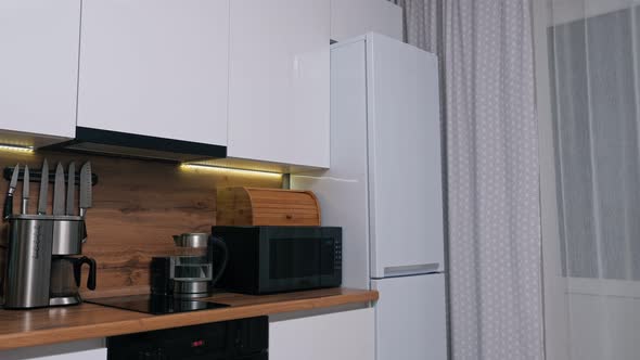 Lady in Gown Runs to Refrigerator to Take Delicious Cake alt