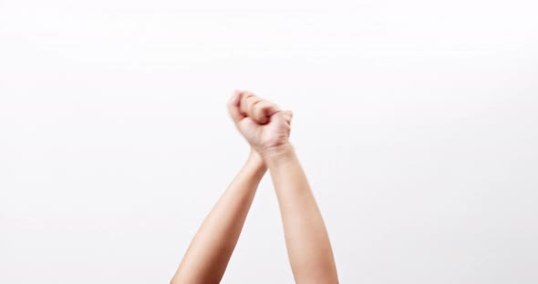 Close up of a fist bump opportunity for cooperation isolated on a white studio background with copy alt
