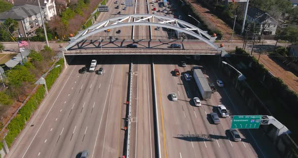 Aerial of cars on 59 South freeway in Houston, Texas on a bright sunny day alt