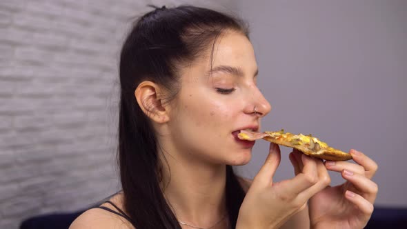 Woman Enjoying Tasty Pizza Biting Pizza Slice