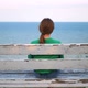 Girl Sitting on A Bench - VideoHive Item for Sale
