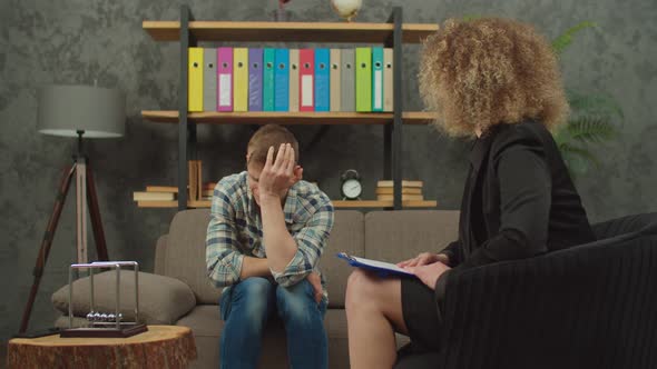 Emotionally Stressed Man with Ptsd Looking for Psychological Assistance alt