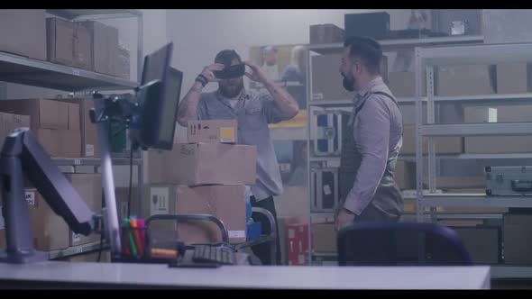 Workers in Distribution Center Playing with VR Headset alt