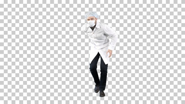 Doctor wearing his uniform and wearing a mask he is walking alt