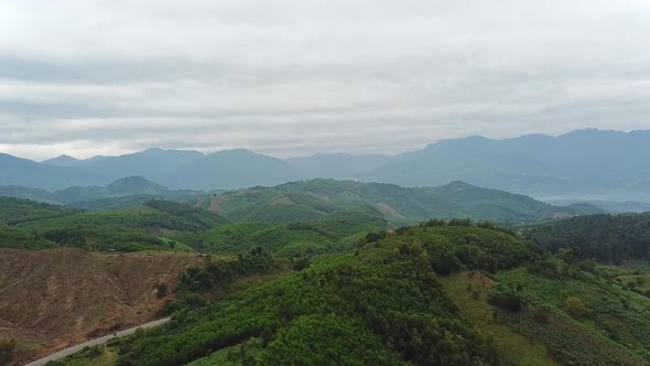 Majestic Foggy Tropical Mountains Landscape,Drone View. alt