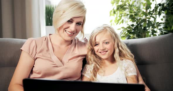 Mother and Daughter with Laptop