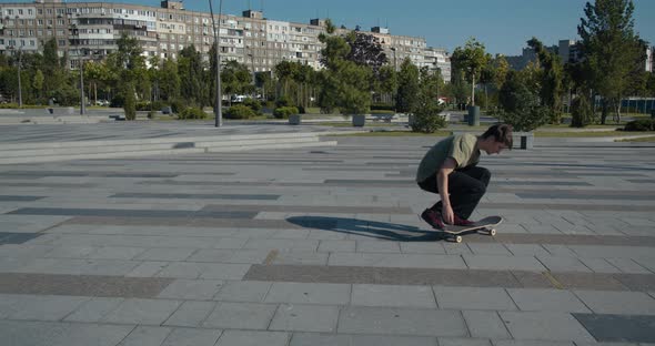 Skateboarding Tricks Done By a Skater Boy on a Sunny Morning,  alt