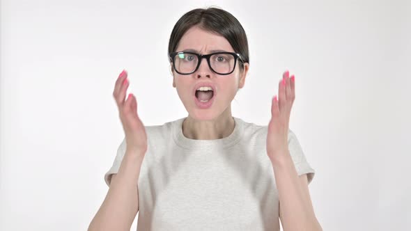 Angry Young Woman Screaming Loud on White Background alt