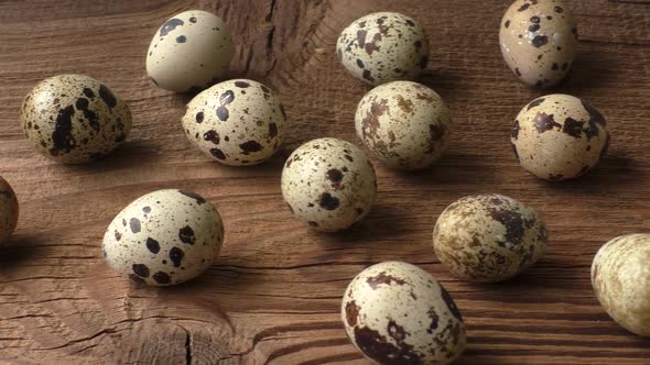 Quail eggs on a wooden board