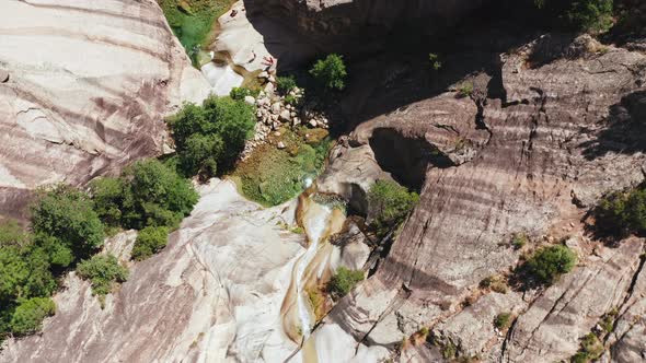 Aerial View of Little Waterfall Natural Swimming Pool Trees on the White Rock alt