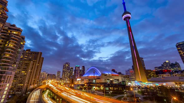 Toronto, Canada, Timelapse - The traffic of the gardiner Expressway and the CN Tower