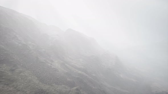 Sun Rays Against the Backdrop of the Mountains alt