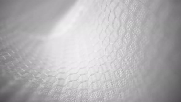 Shiny Net Cloth Flowing Texture Dolly Shot in Close Up View Macro alt