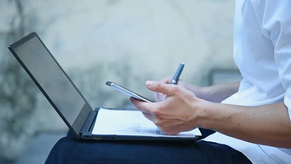 Businessman Using Mobile Phone alt