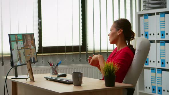 Freelancer Having Video Call in Office alt